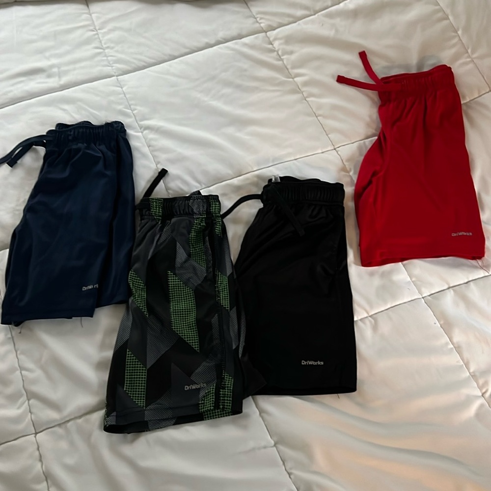 Four pairs boys athletic driworks shorts size M 8